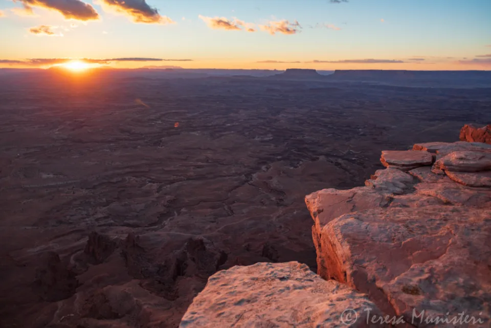 Sunset from a sandstone ledge above the canyons, Island in the Sky