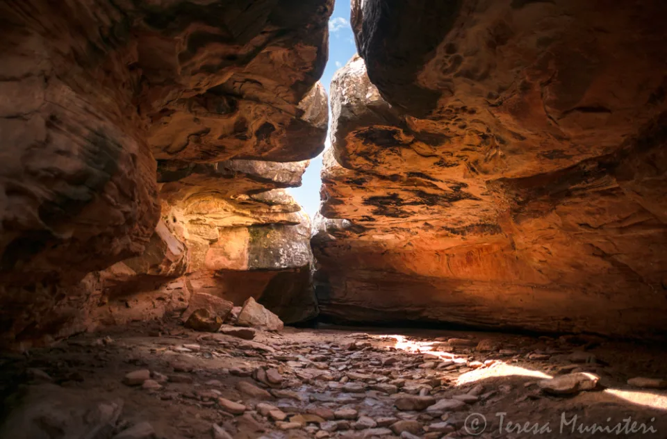 Warm reflected light inside a sandstone alcove