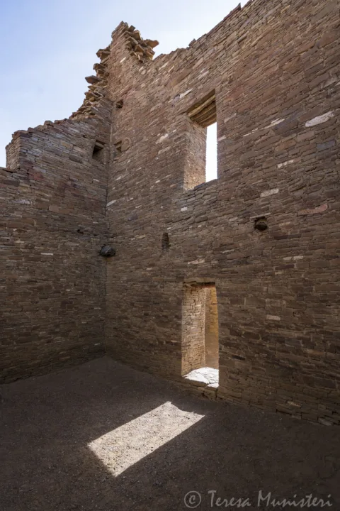 Sunlight through the windows of a stone great house at Chaco Canyon