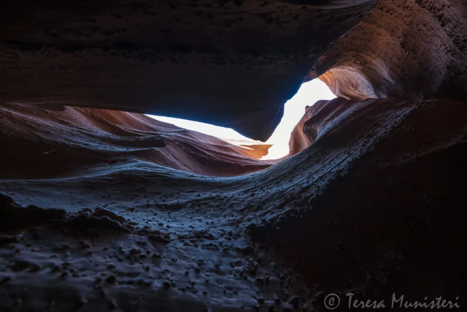 A sculpted sandstone opening in a slot canyon
